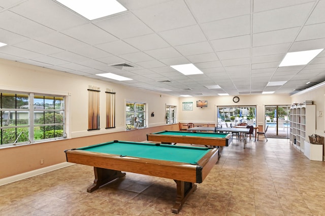 playroom featuring light tile patterned flooring, pool table, and a healthy amount of sunlight