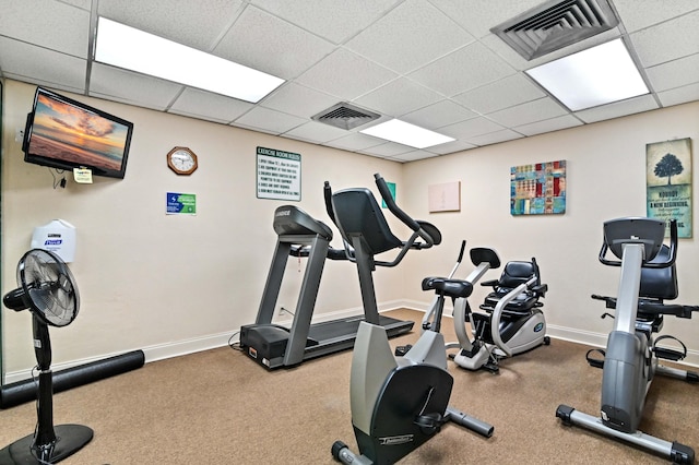 workout area with a drop ceiling