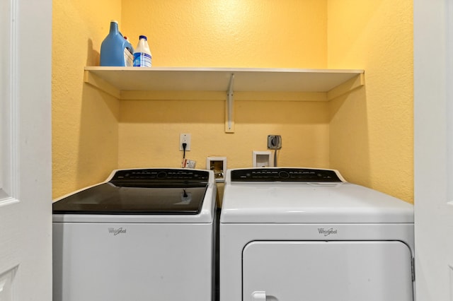 laundry room featuring washing machine and dryer