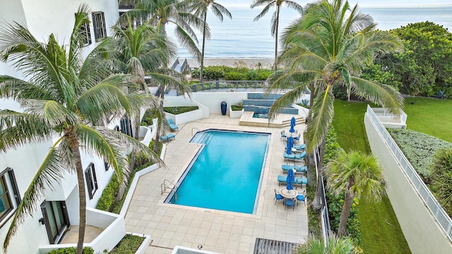 view of swimming pool with a patio area