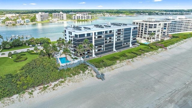 birds eye view of property featuring a water view