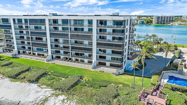 view of property with a water view