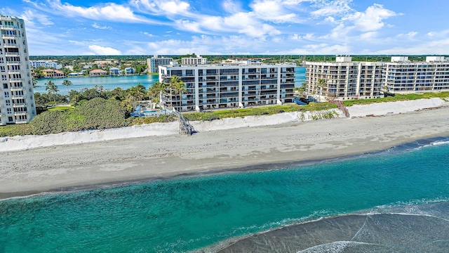 aerial view with a view of the beach and a water view