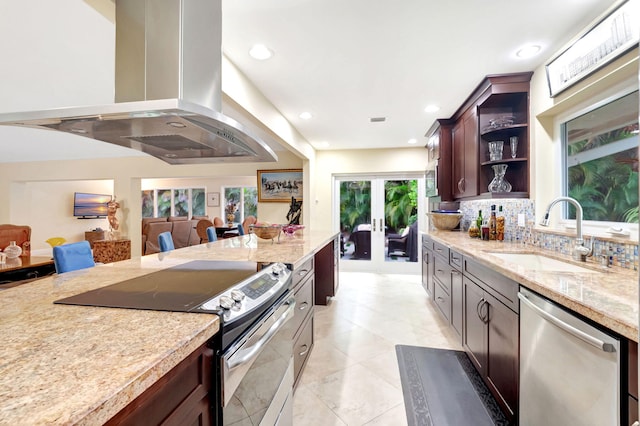 kitchen featuring backsplash, light tile patterned floors, stainless steel appliances, sink, and island exhaust hood