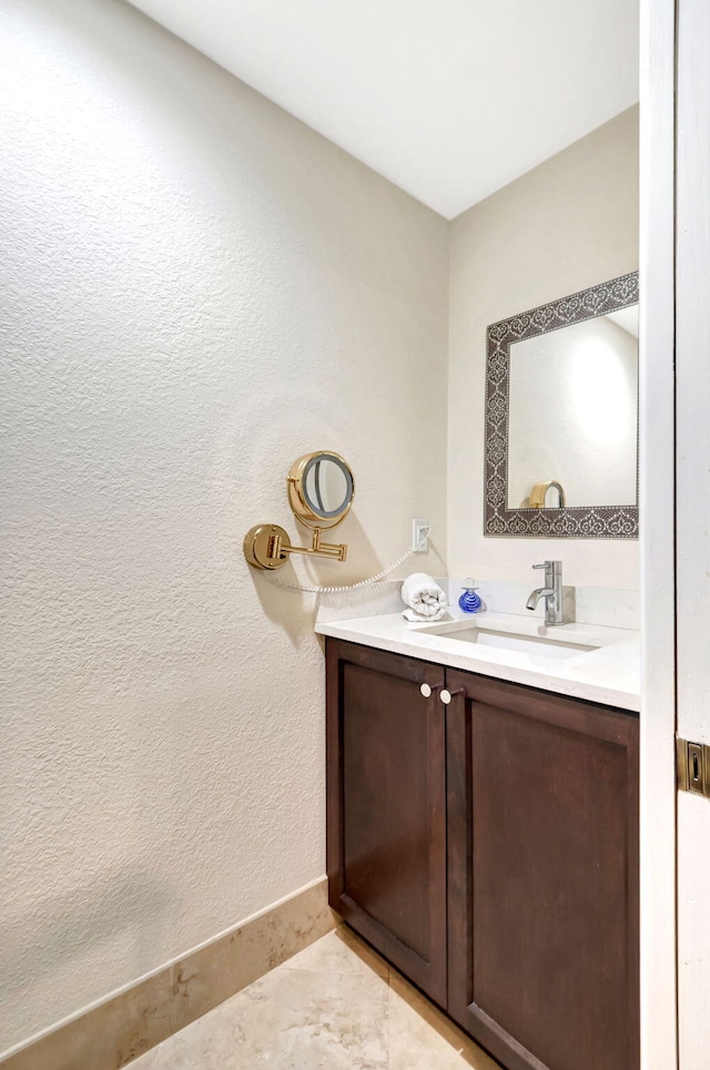 bathroom featuring vanity and tile patterned flooring