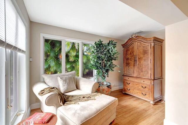 sitting room with light wood-type flooring