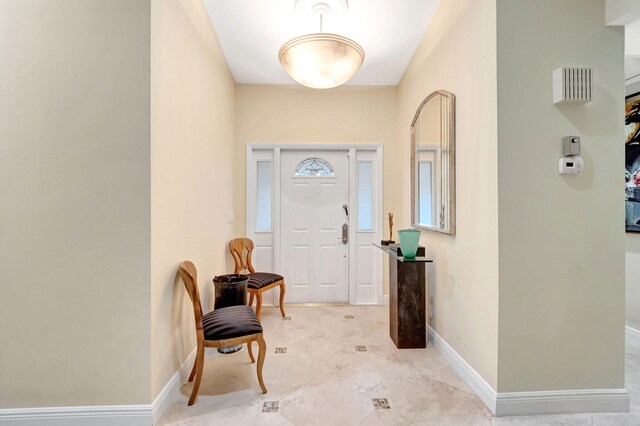 view of tiled foyer entrance