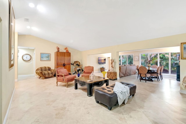 tiled living room with lofted ceiling