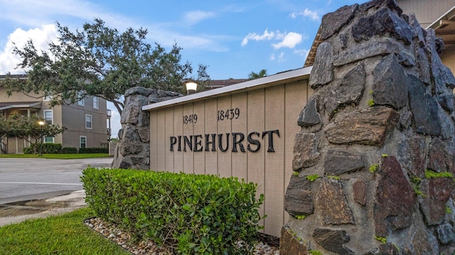 view of community sign