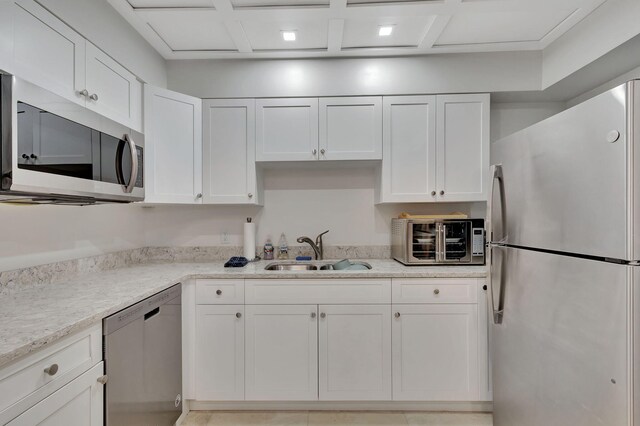 interior space featuring a tray ceiling, ornamental molding, and a chandelier