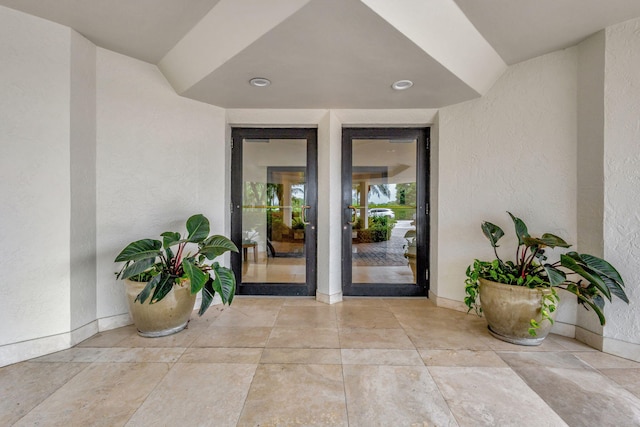 entrance to property with a patio