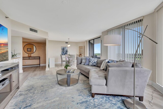 living room with light wood-type flooring