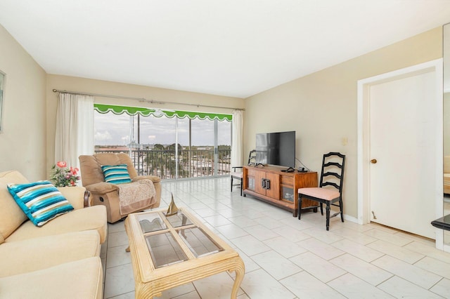 living room featuring light tile patterned flooring