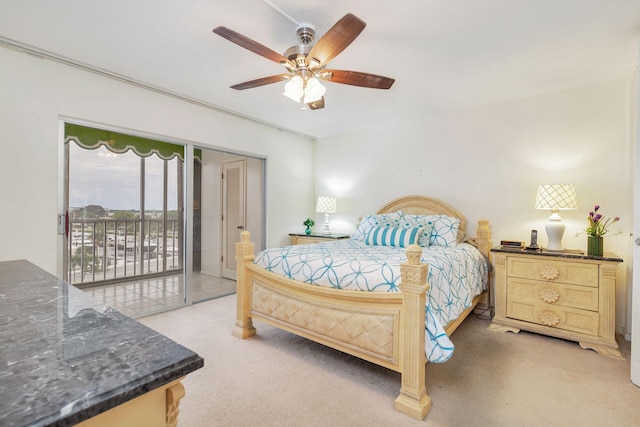 bedroom with access to exterior and ceiling fan