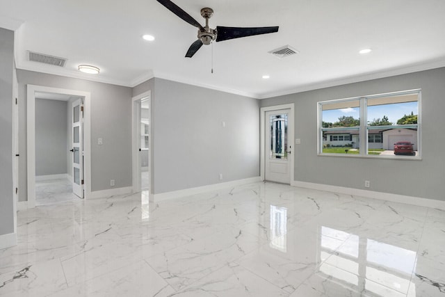 spare room with light tile patterned floors, ornamental molding, and ceiling fan