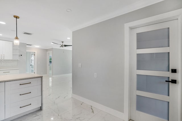 bathroom with decorative backsplash, tile patterned floors, vanity, ceiling fan, and crown molding