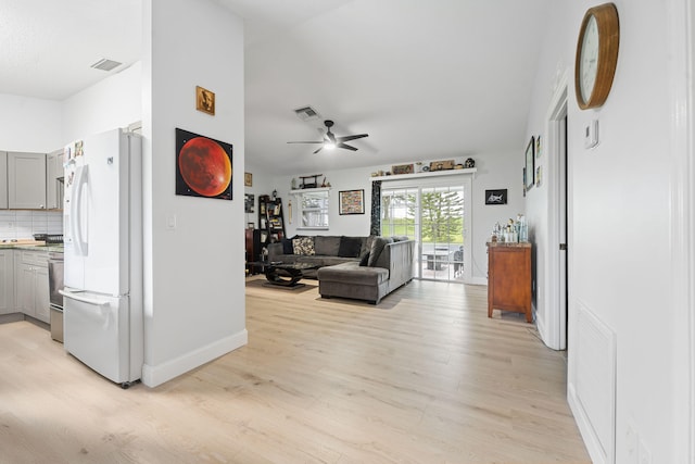 interior space featuring ceiling fan and light hardwood / wood-style flooring