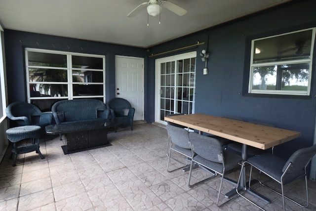 view of patio with ceiling fan and outdoor lounge area