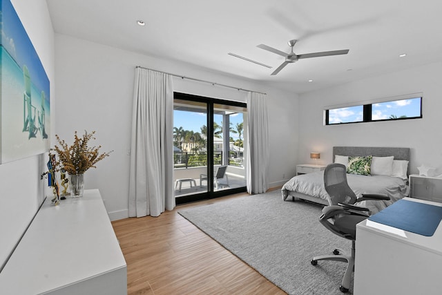 bedroom featuring access to exterior, ceiling fan, and light hardwood / wood-style floors