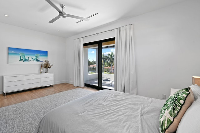 bedroom featuring ceiling fan, light wood-type flooring, and access to exterior