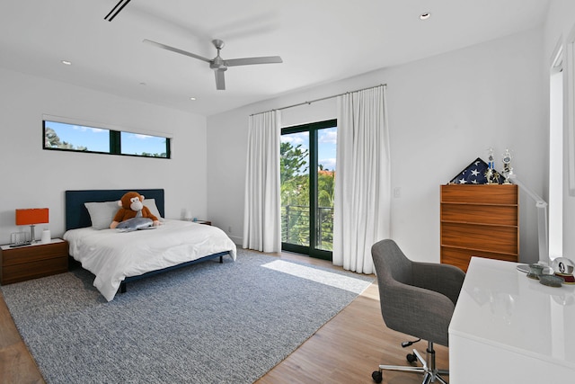 bedroom featuring hardwood / wood-style floors and ceiling fan