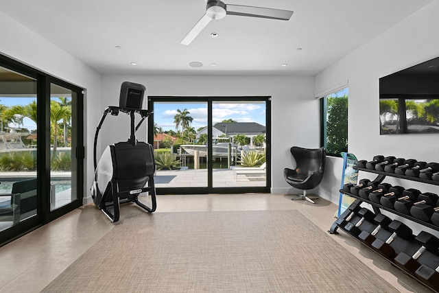 workout area with ceiling fan and plenty of natural light