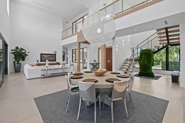 dining room featuring a high ceiling