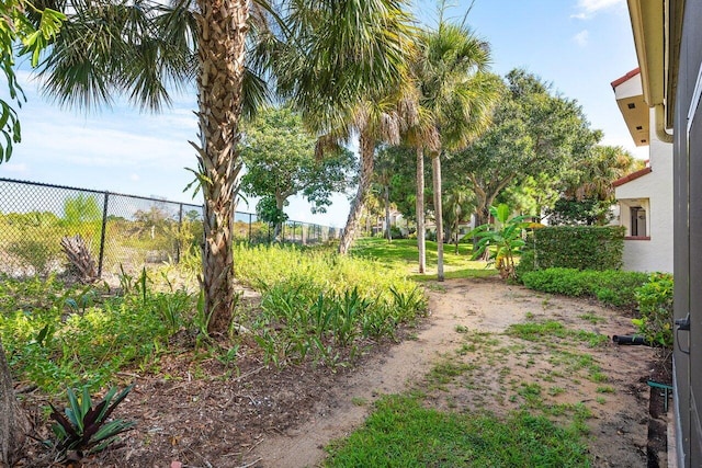 view of yard featuring fence