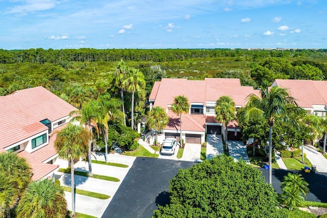 bird's eye view with a view of trees