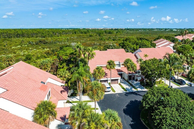 aerial view featuring a view of trees