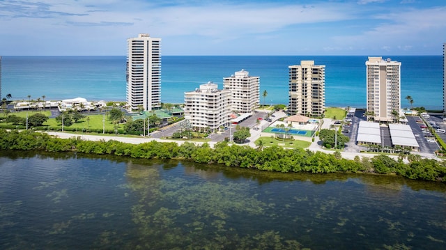 birds eye view of property featuring a water view