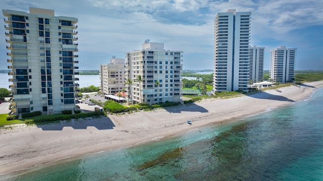 aerial view with a beach view and a water view