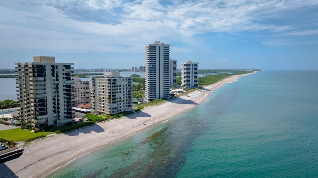 aerial view with a view of the beach and a water view