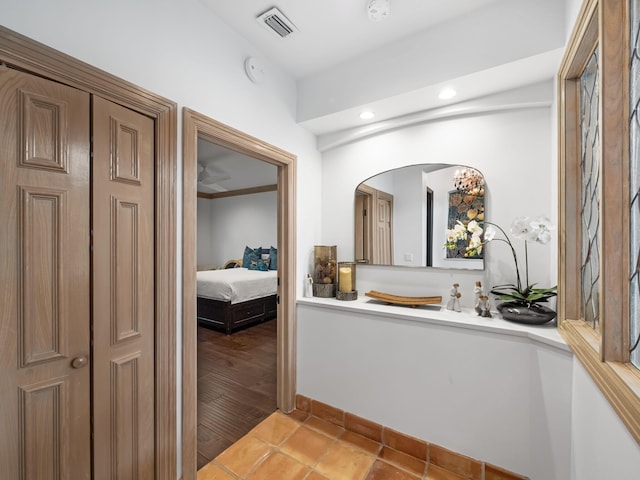 bathroom featuring wood-type flooring