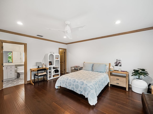 bedroom with ceiling fan, hardwood / wood-style floors, crown molding, and ensuite bath