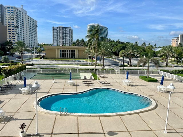 view of pool featuring a patio