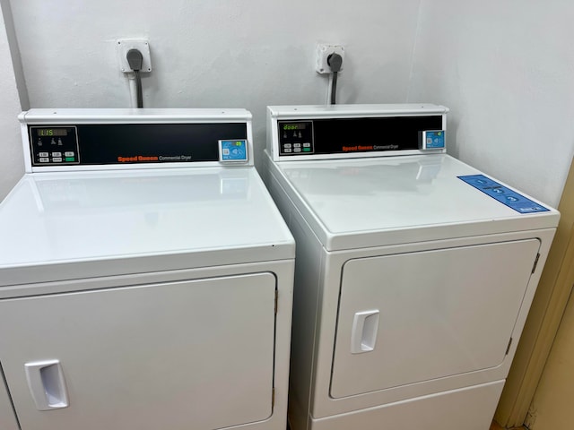 laundry area with washer and dryer