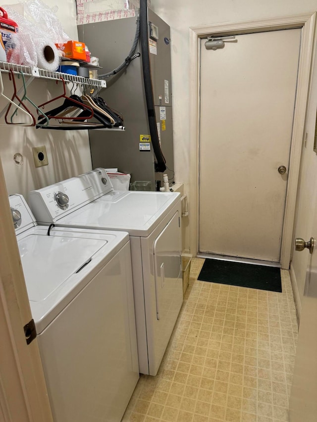 laundry room featuring separate washer and dryer