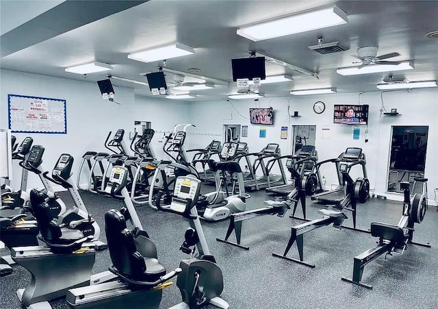 workout area with ceiling fan