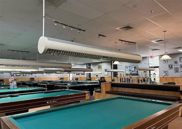 playroom featuring billiards and wood walls