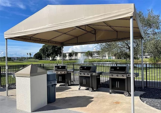 surrounding community featuring a lawn, a patio area, and a gazebo