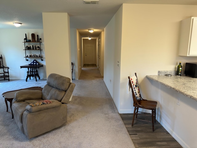 living room with hardwood / wood-style floors