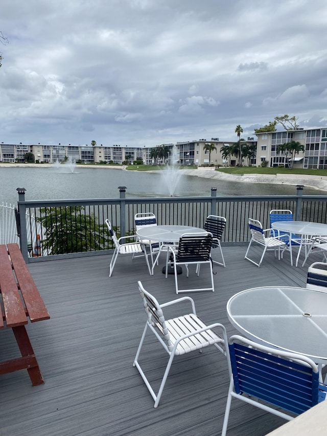 wooden terrace with a water view