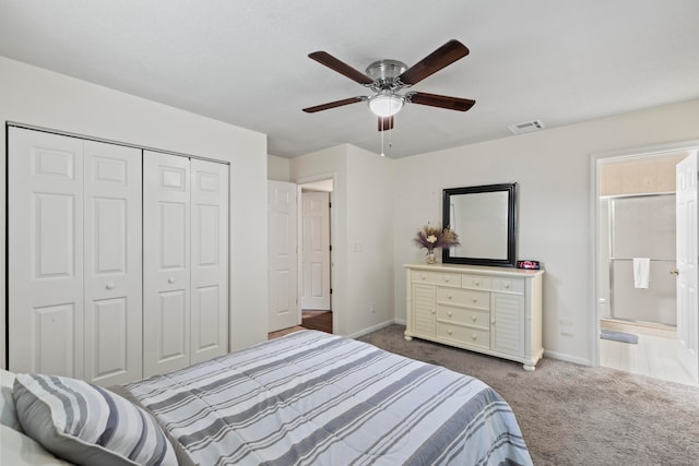 bedroom with carpet floors, a closet, ceiling fan, and connected bathroom