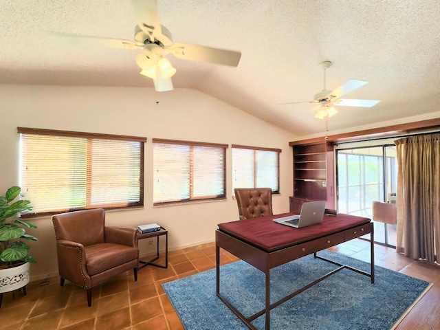 2450 Riviera Dr, Delray Beach, FL 33445 - tiled office with vaulted ceiling, a ceiling fan, baseboards, and a textured ceiling