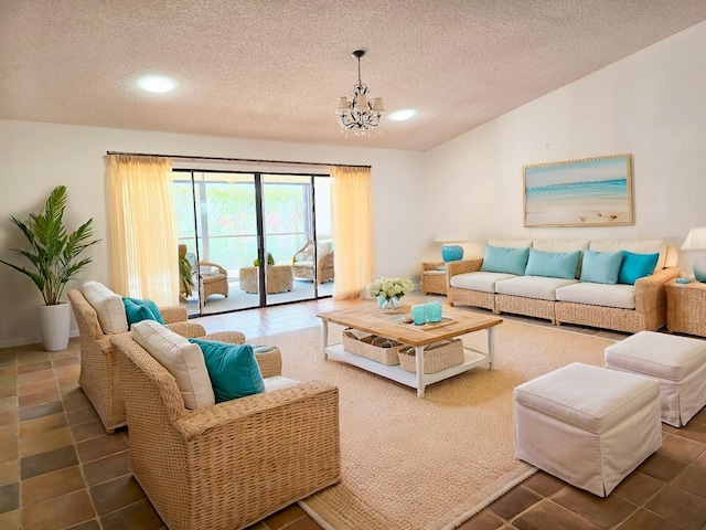 2450 Riviera Dr, Delray Beach, FL 33445 - living area with a textured ceiling and a chandelier