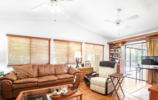 living room featuring light tile patterned floors, a textured ceiling, ceiling fan, and lofted ceiling