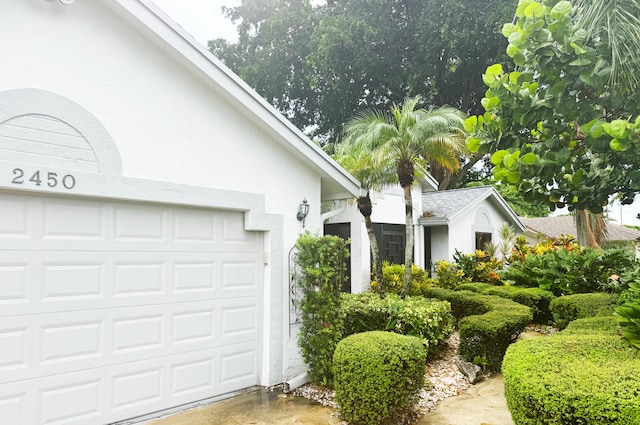 exterior space with a garage