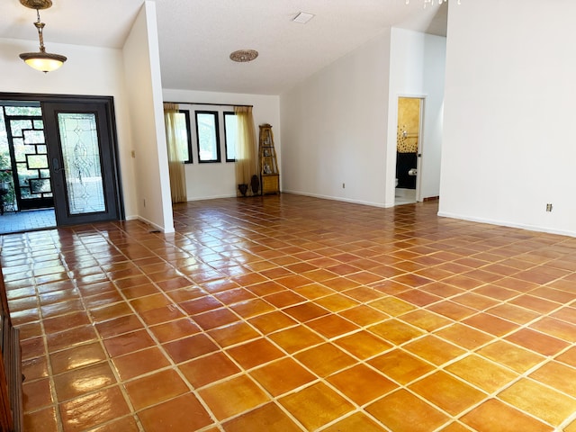 tiled entrance foyer with french doors