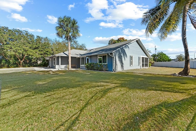 view of front of property with a front lawn